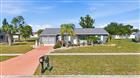 6389 COLISEUM BLVD, PORT CHARLOTTE, FL - MLS# C7526639