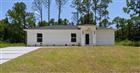 1120 RAVENSWOOD ST E, LEHIGH ACRES, FL - MLS# C7528594
